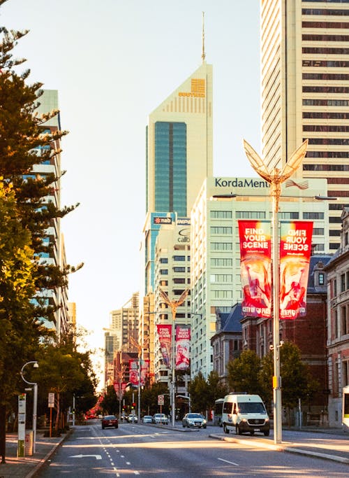 A city street with tall buildings and tall buildings