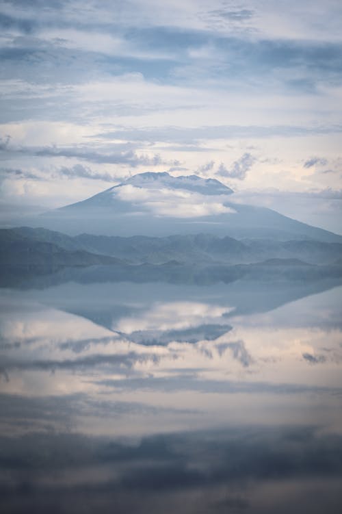 Clouds and Mountains Reflected in a Lake