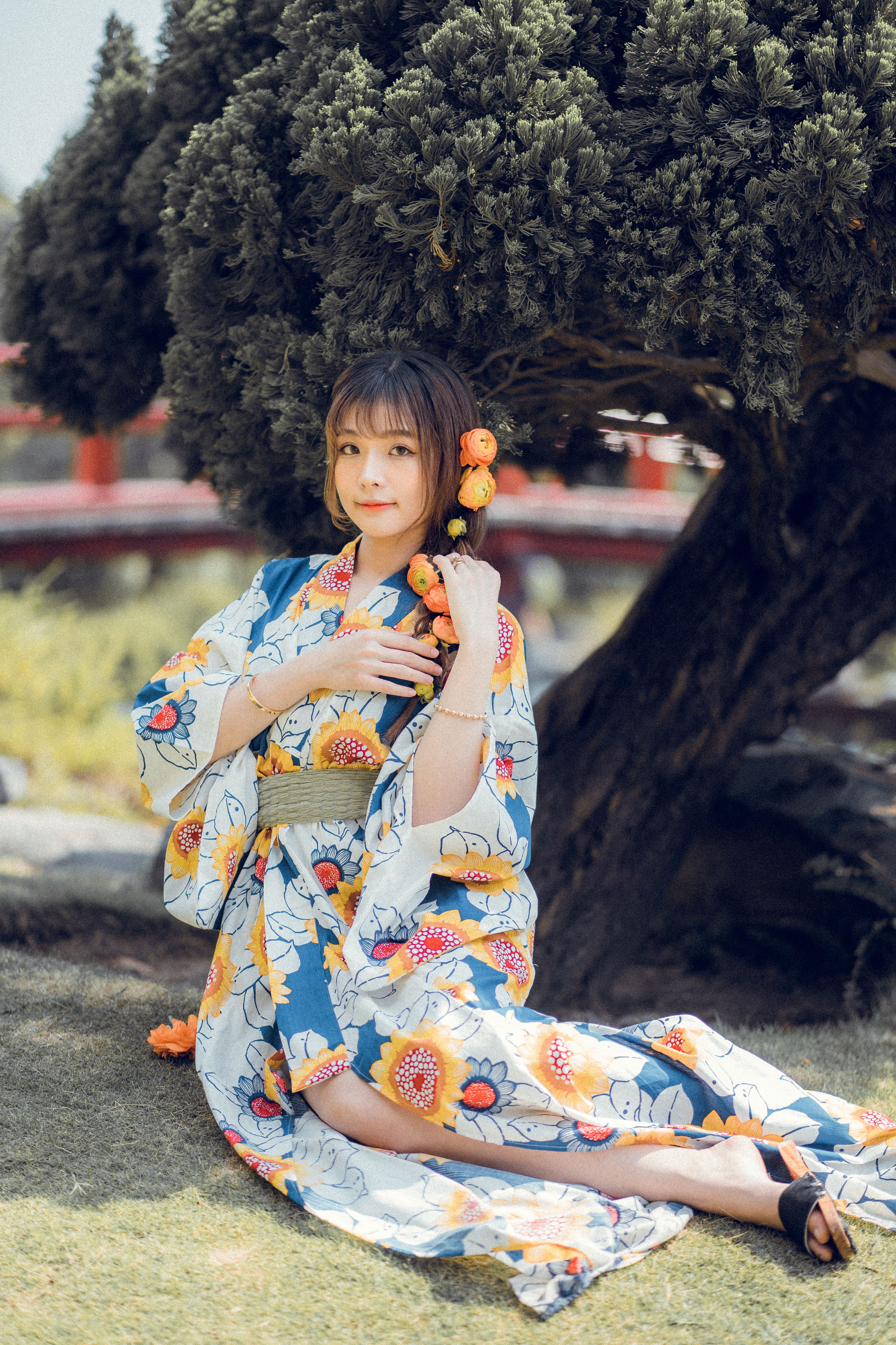 Woman in a Kimono Sitting on the Ground by a Window · Free Stock Photo