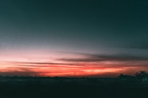 Free Breathtaking view of a vibrant sunset over the rural landscape of Pedro Escobedo, Mexico. Stock Photo