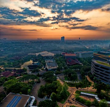 Aerial view of Sindang Jaya, Banten at sunset, showcasing the urban landscape and modern architecture.