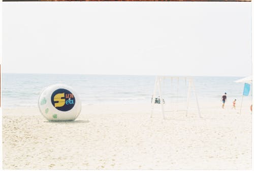 Swings and Ball on Beach