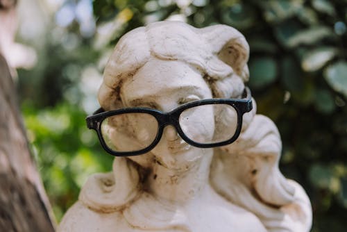 Eyeglasses on Marble Sculpture Head