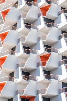 Discover the unique geometric facade of a modern Dubai apartment building, capturing repetition and design innovation.