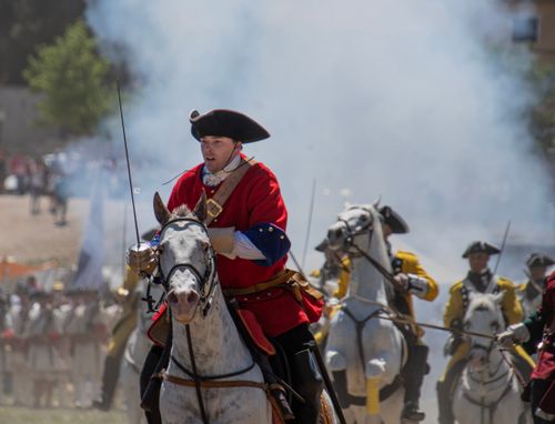 Free Dramatic cavalry charge during a historic military reenactment in Almansa, Spain. Stock Photo