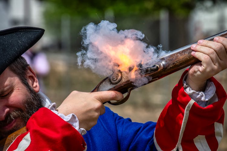 Man Shooting From Musket