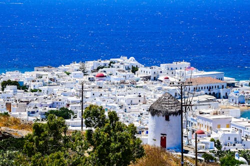 Town with White Buildings on Sea Shore in Greece