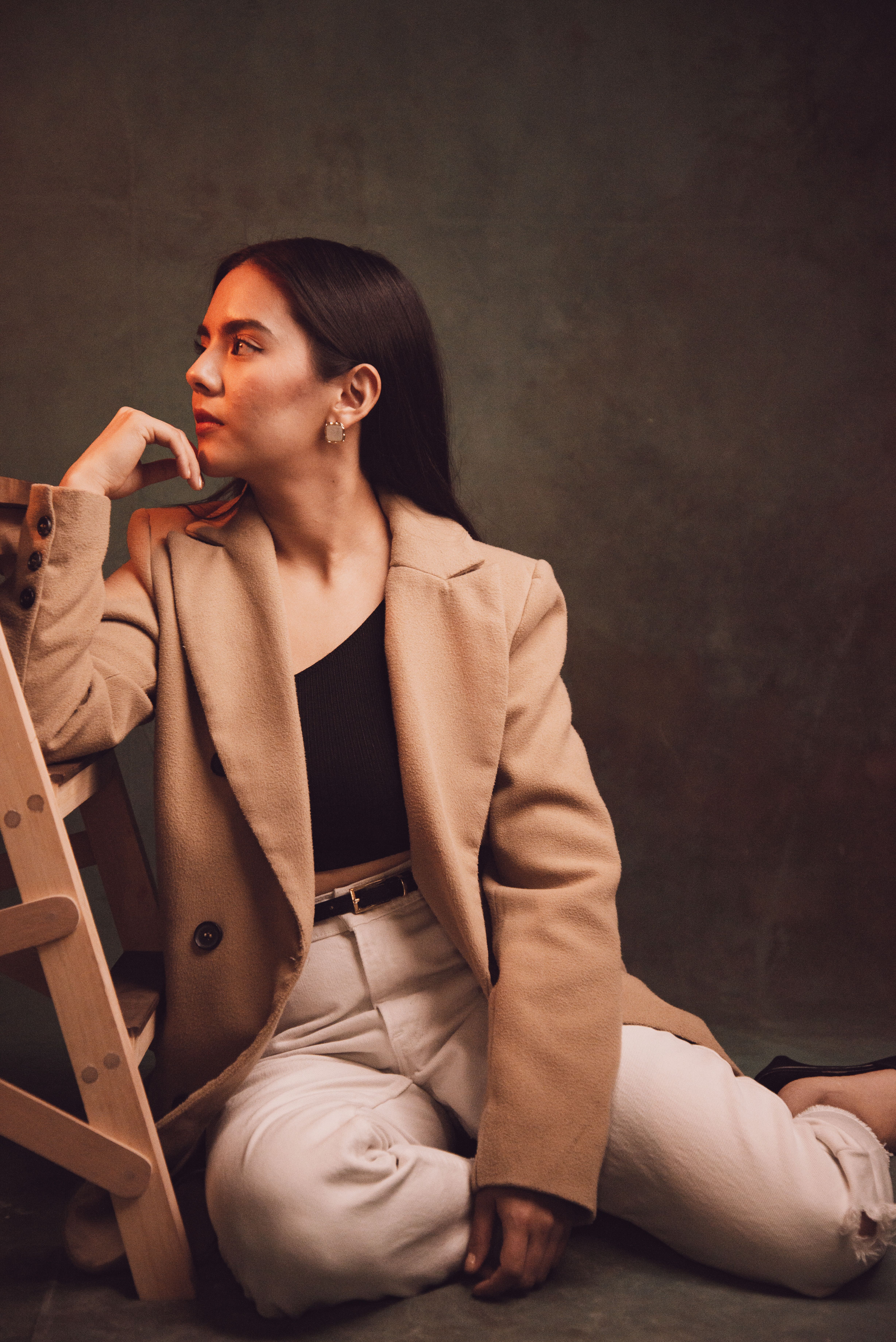 Young woman in a Fashionable Outfit Posing in Studio · Free Stock Photo