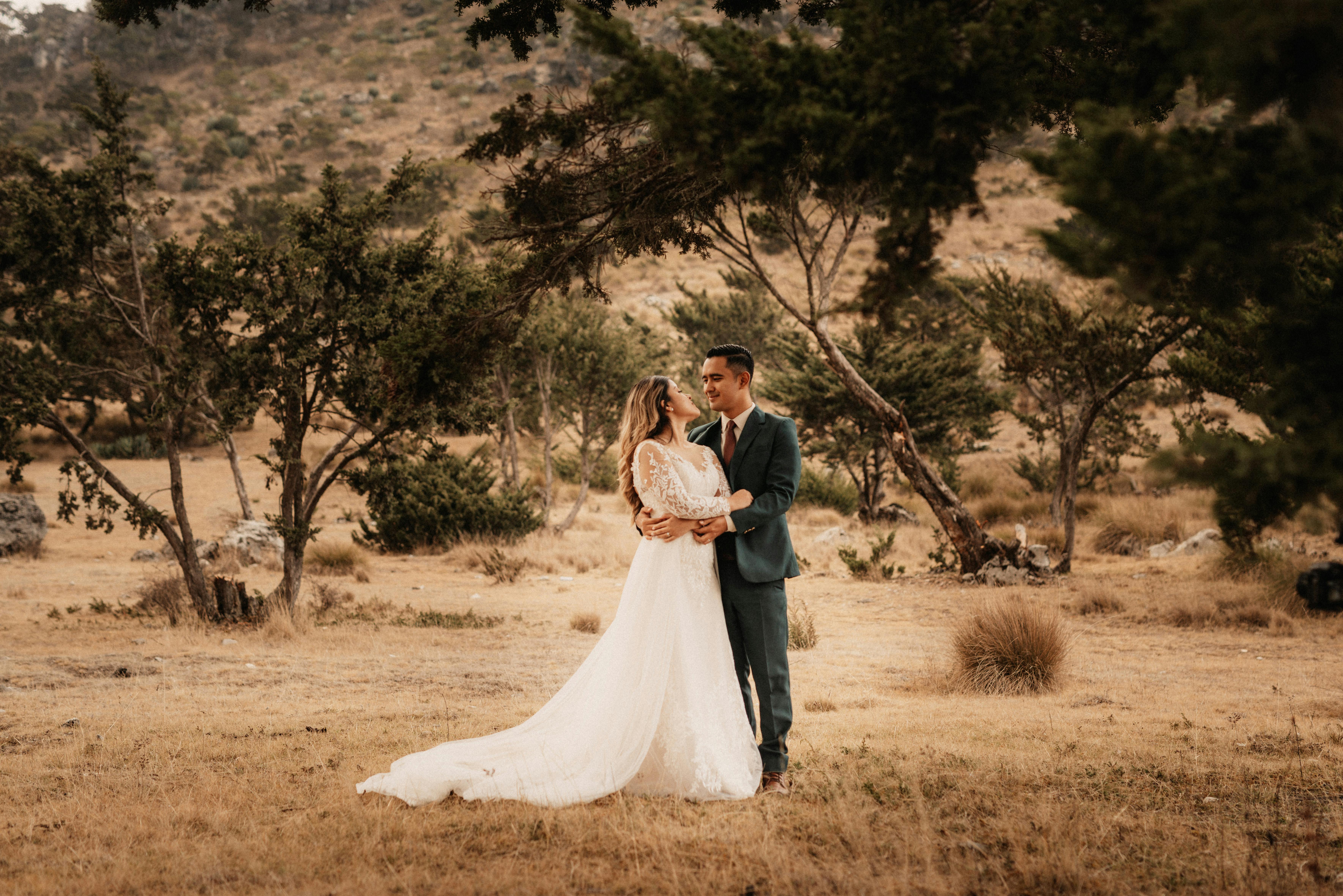 Couple during their elopement ceremony at a White Mountain National Forest landmark