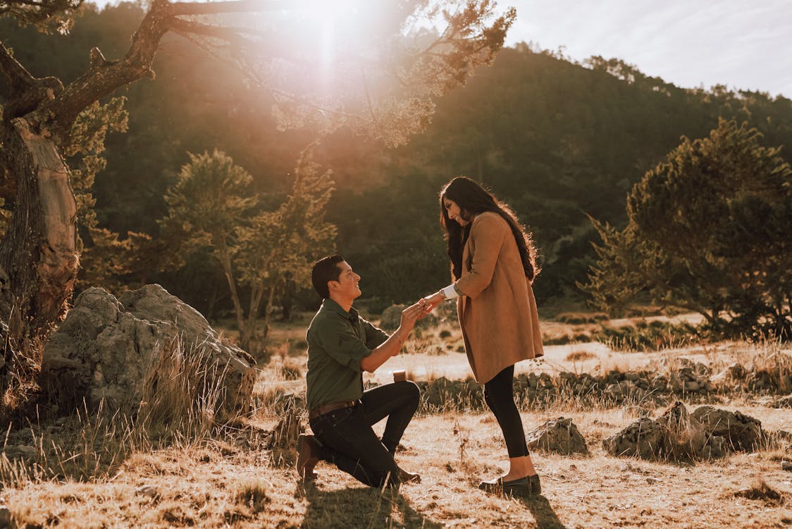 Photo of a Man Proposing to his Partner · Free Stock Photo