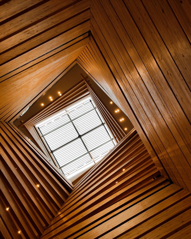 Slatted Wood Panel Ceiling Detail with Warm LED Strips