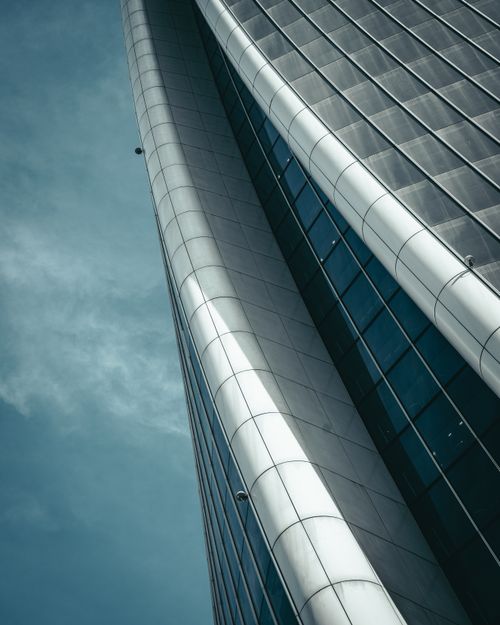 Free Dramatic view of a modern skyscraper in Milan, highlighting its unique architecture. Stock Photo