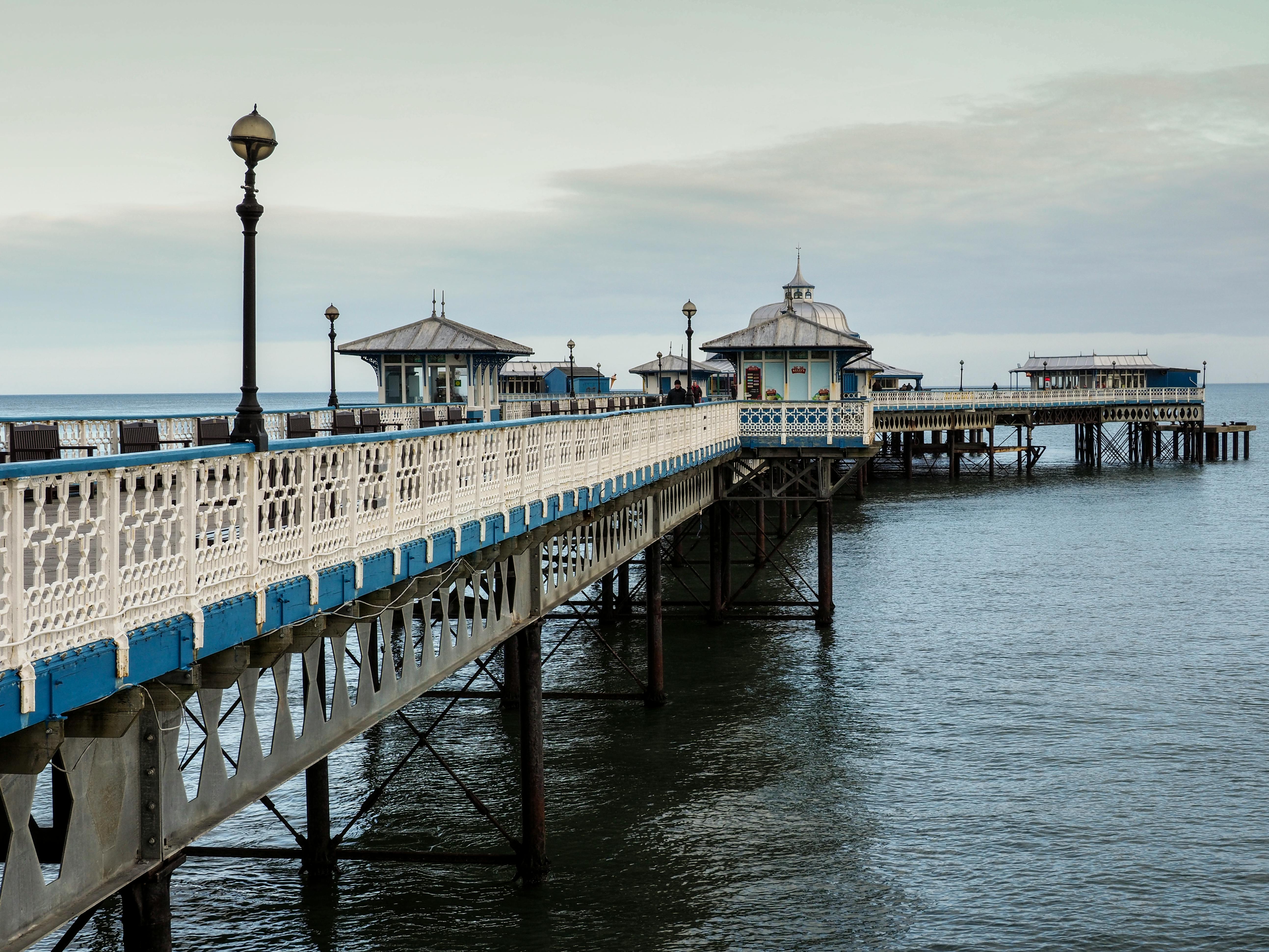 Jetty Structure over the Sea on a Gray Day · Free Stock Photo