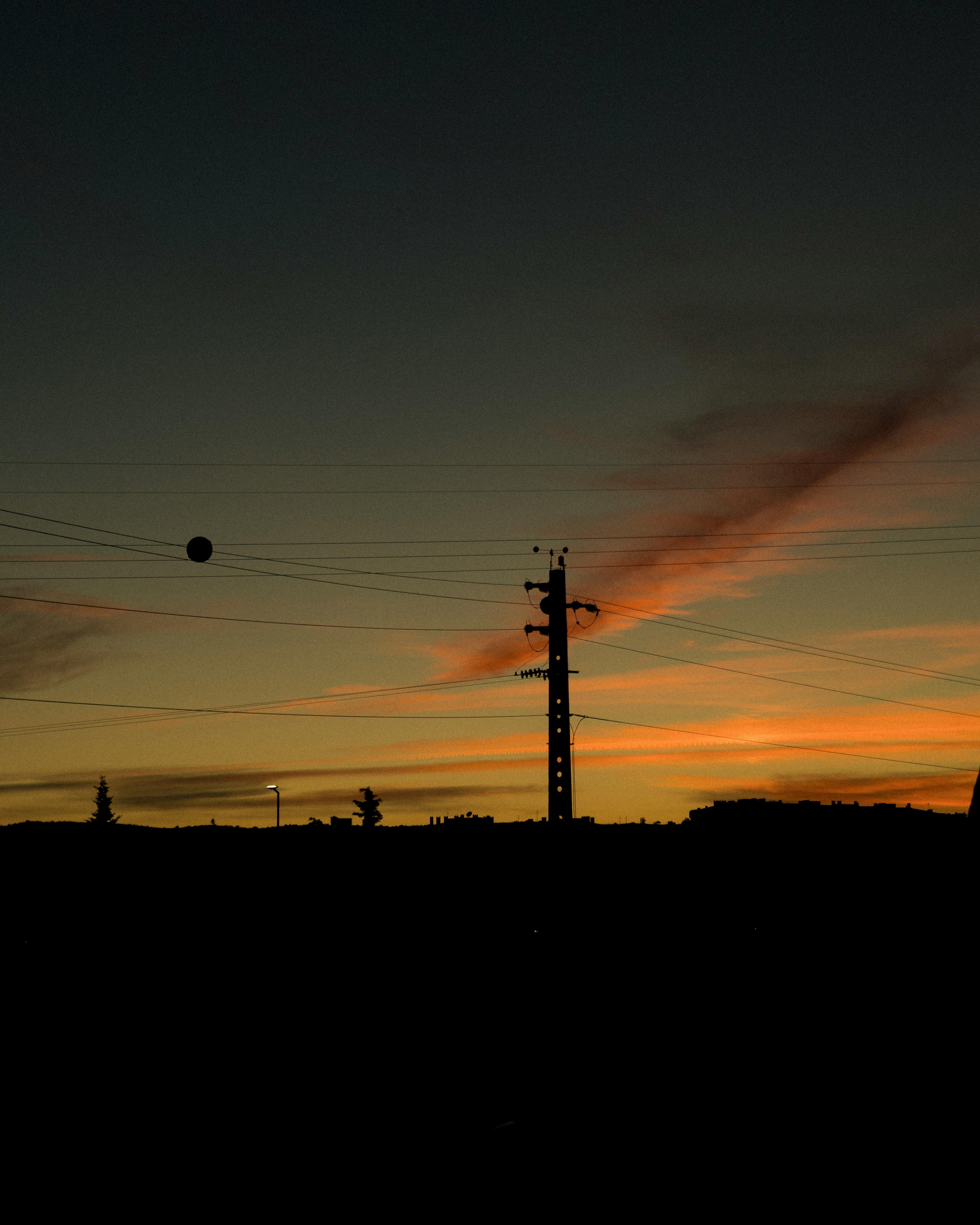 electricity post at dusk