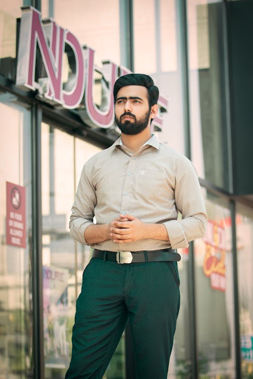 Bearded Model in Shirt and Green Pants