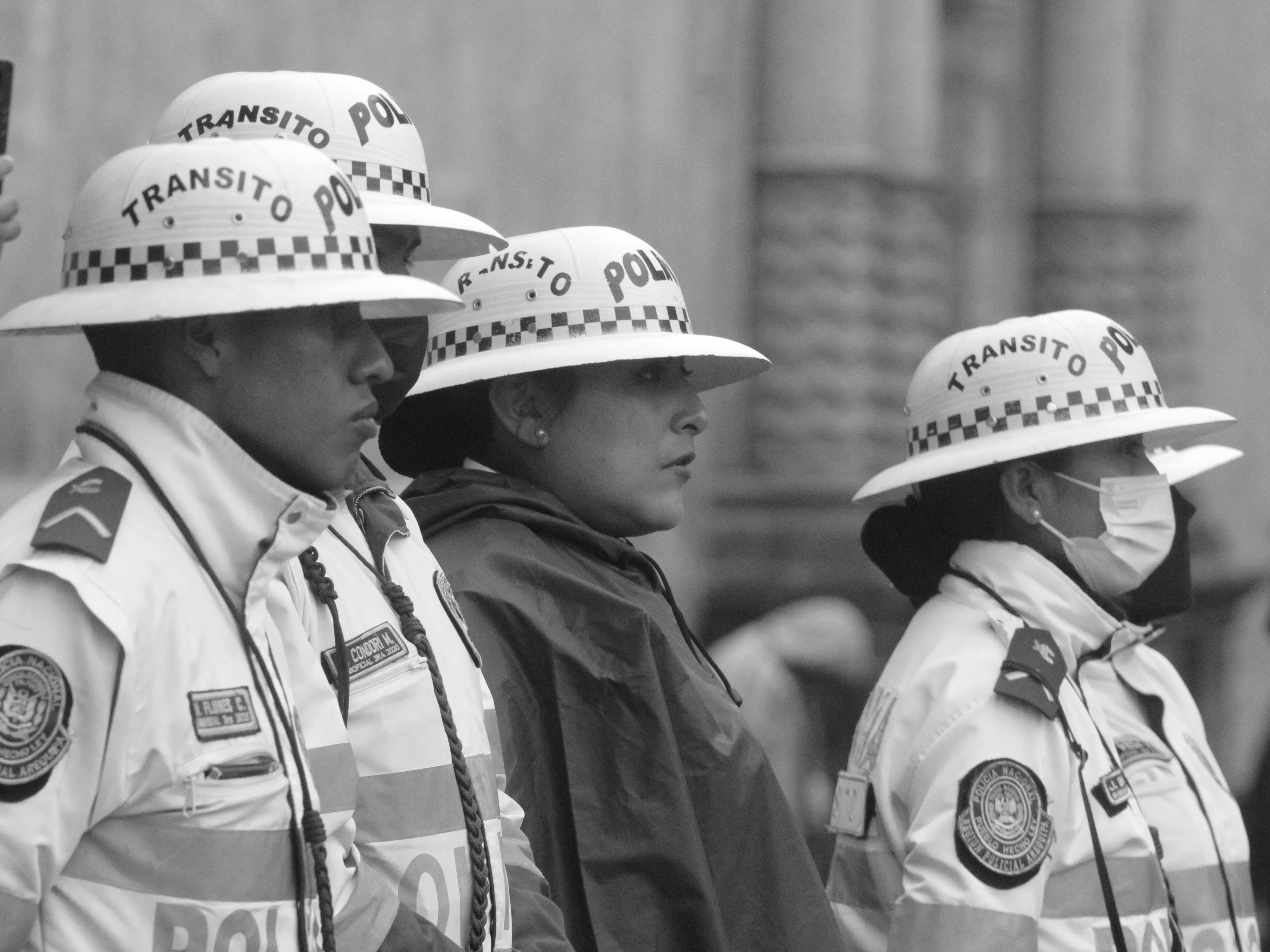 Police Officers in Uniforms and Hats