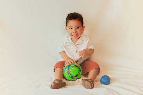 Studio Shoot of a Boy with Toys