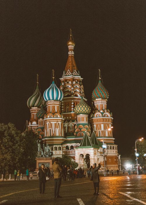 Free Beautiful night view of Saint Basil's Cathedral in Moscow with tourists. Stock Photo
