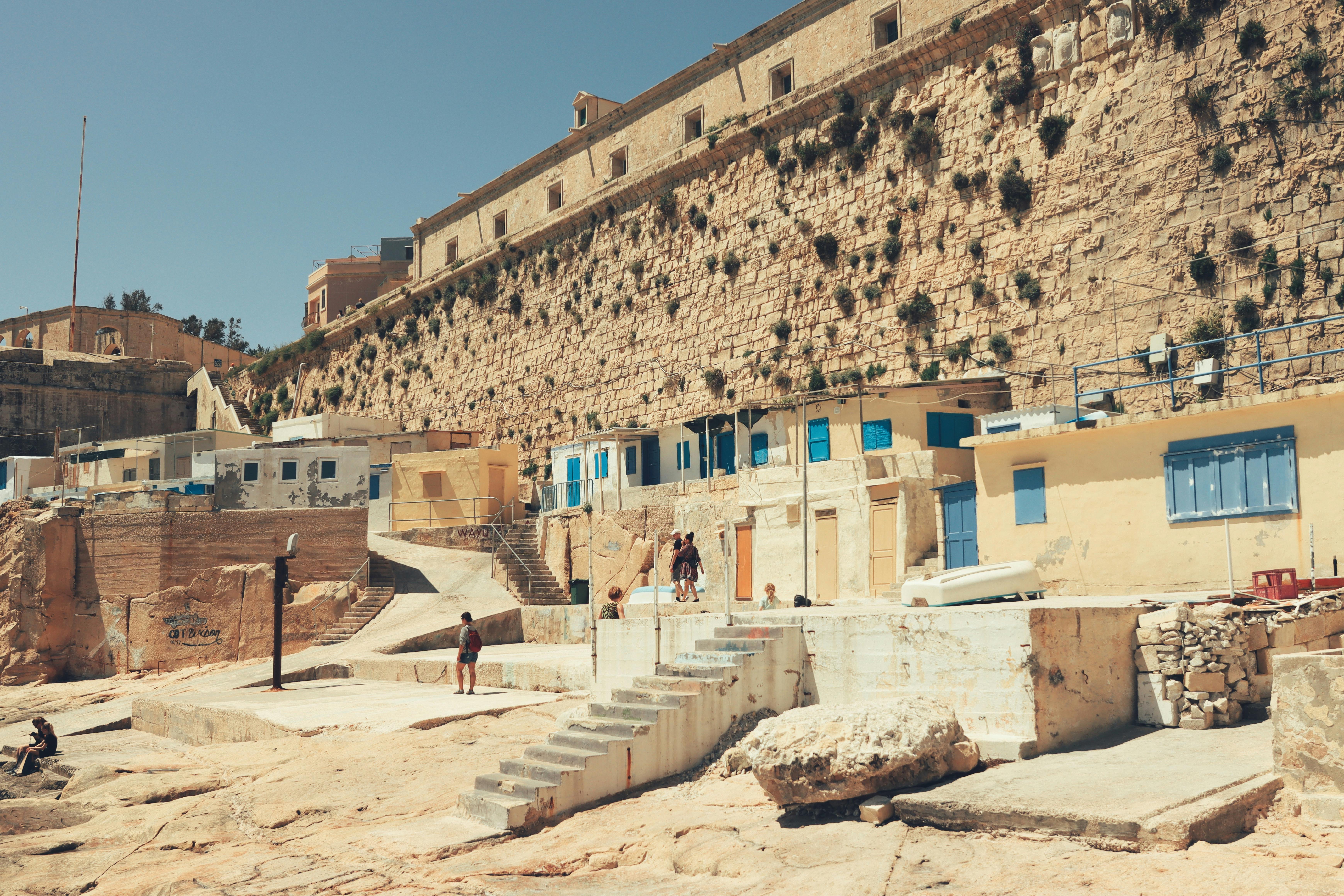 Explore the sunlit stone architecture of Valletta, Malta, showcasing historic urban charm and vibrant Mediterranean culture.
