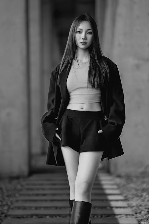 Woman Posing in Skirt in Black and White