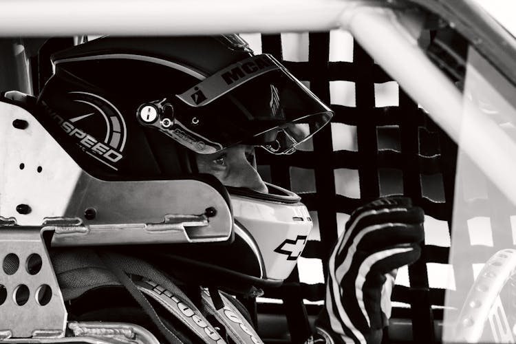 Pilot In Racing Helmet In Black And White