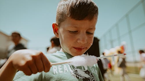 Boy Eating Cotton Candy