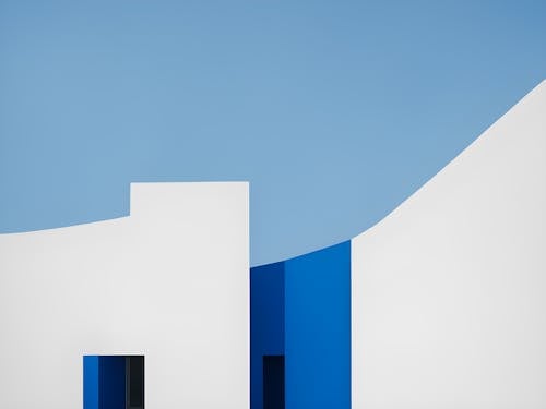Modern Geometric Buildings against Blue Sky