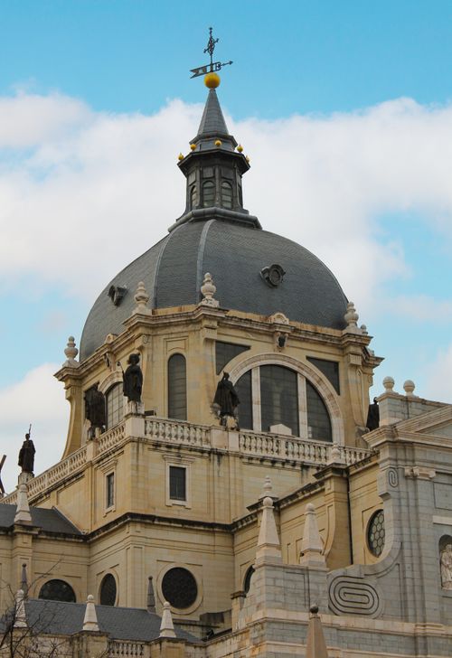 Free Close view of Almudena Cathedral's dome and architecture in Madrid, Spain, with a clear blue sky. Stock Photo