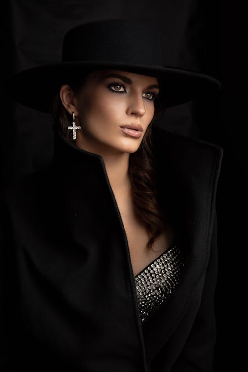 Portrait of Woman in Black Coat and Hat