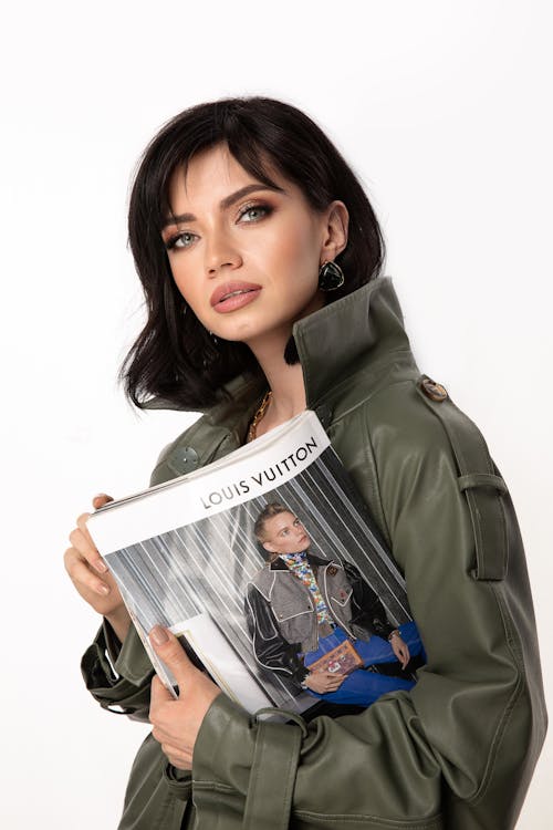 Woman Holding a Fashion Magazine 