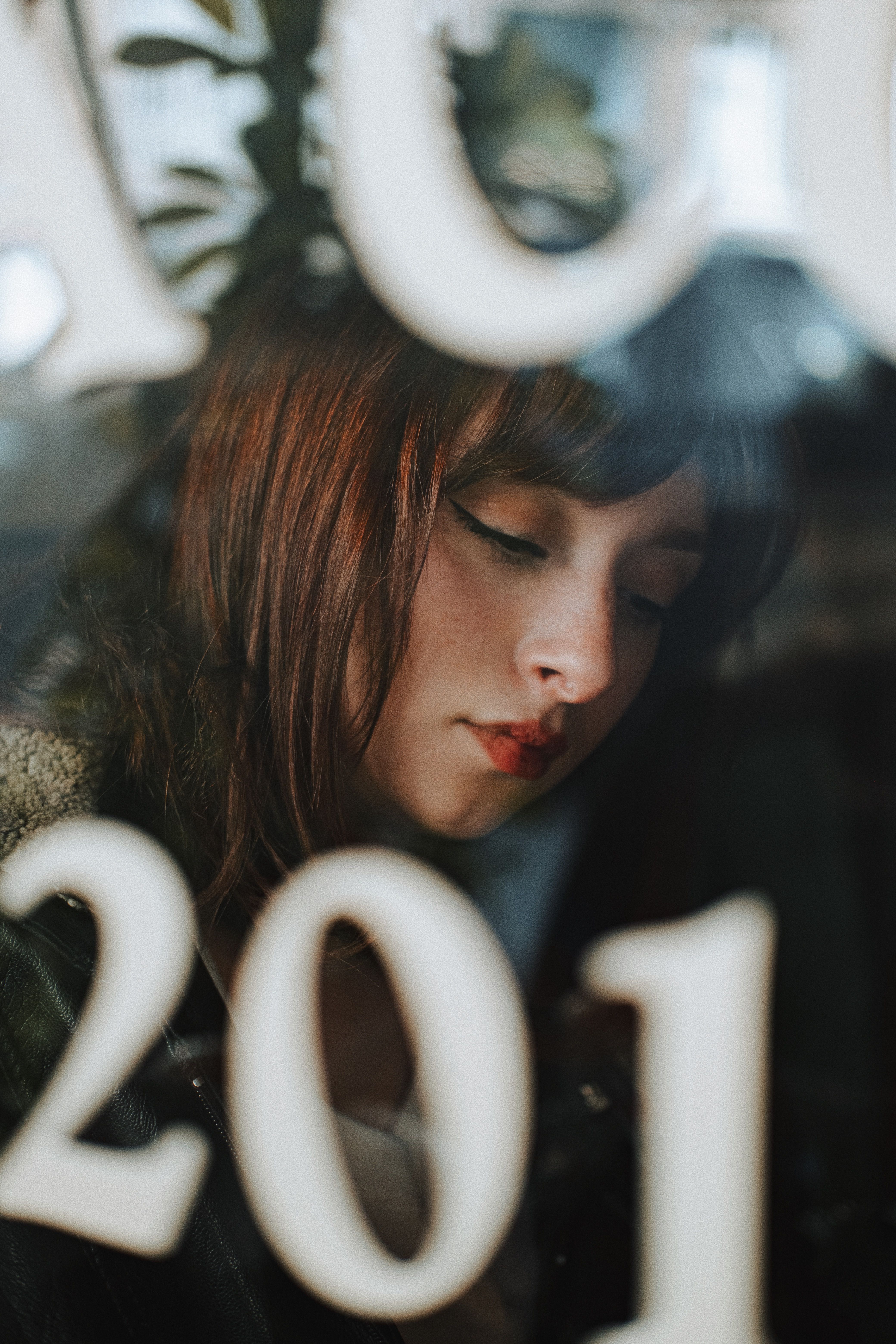 Woman Behind a Restaurant Window · Free Stock Photo