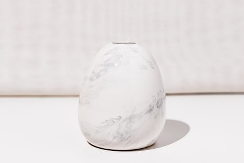 White fine detailed small flower vase