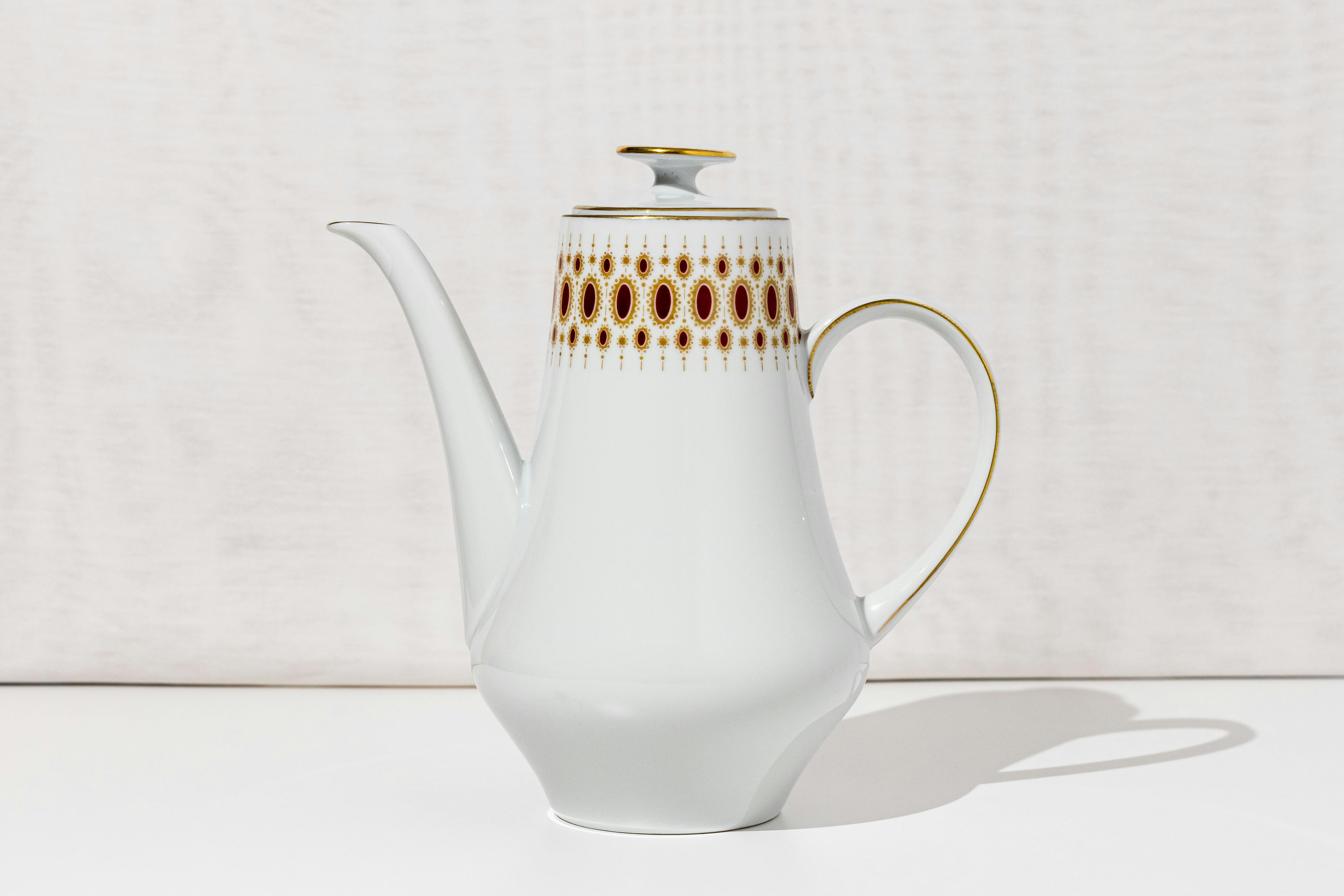 white porcelain tea pot with fine details