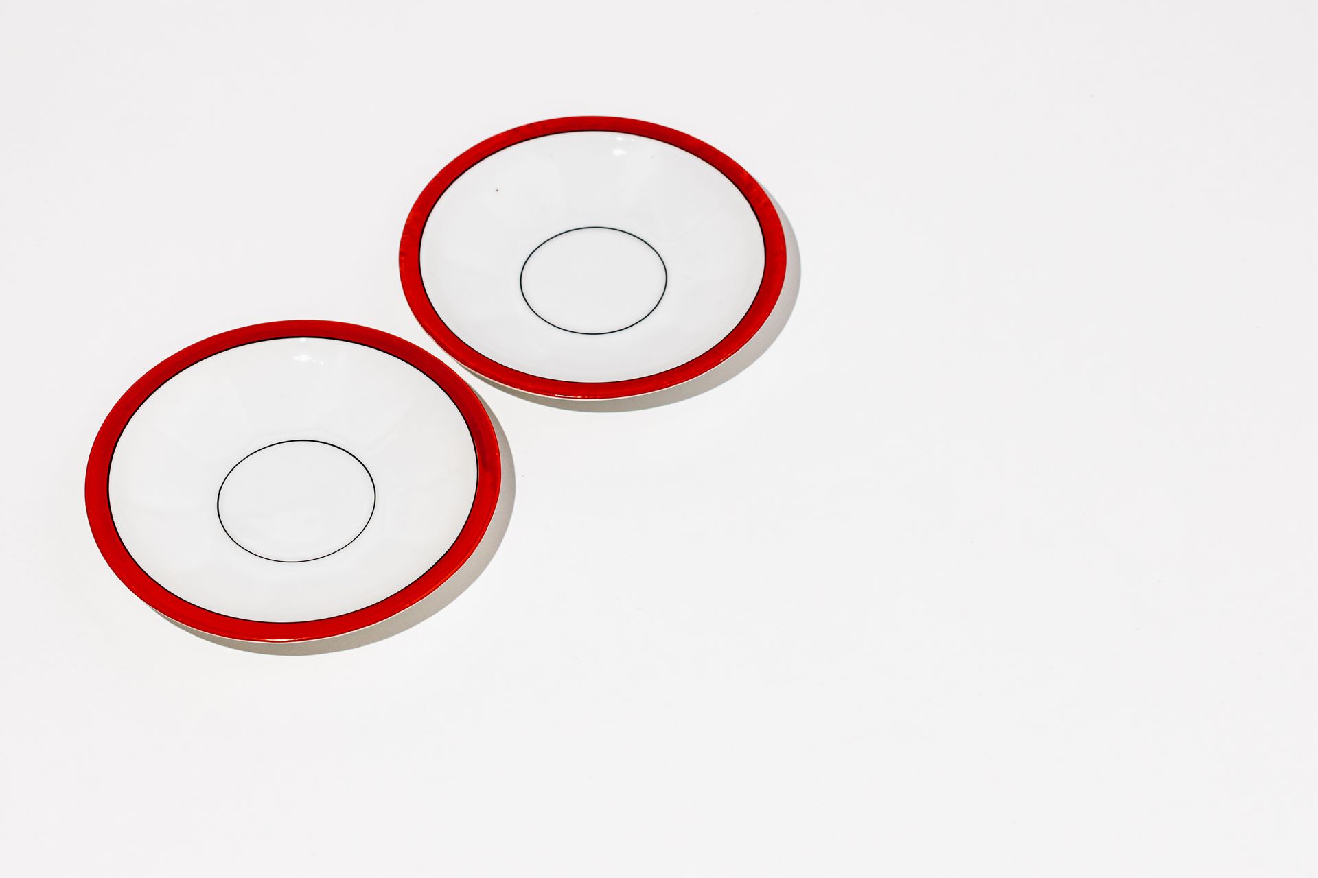 Porcelain small white plates with interesting detail