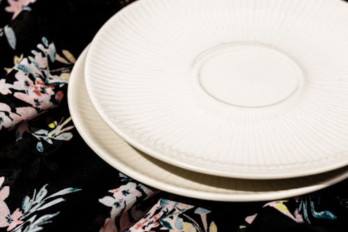 Porcelain small white plates with interesting detail