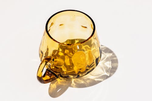 Golden glass cups with interesting dark details
