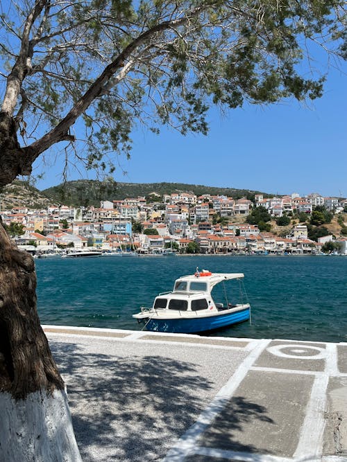 Motorboat in Town on Sea Coast