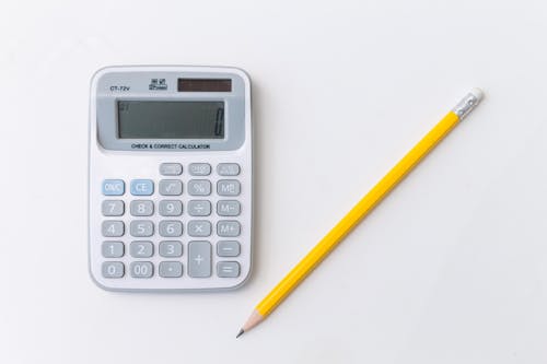 Free stock photo of black and white, calculator, pencil