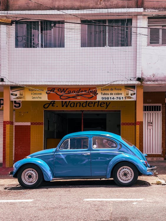 Blue Car on a Street 