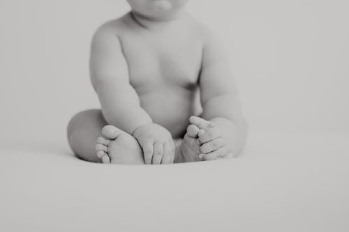 Gratis arkivbilde med baby, hvit bakgrunn, naken
