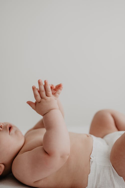 Free Baby Lying on Back Stock Photo