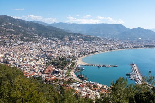Free A breathtaking aerial view of Alanya, showcasing its vibrant cityscape and coastline. Stock Photo