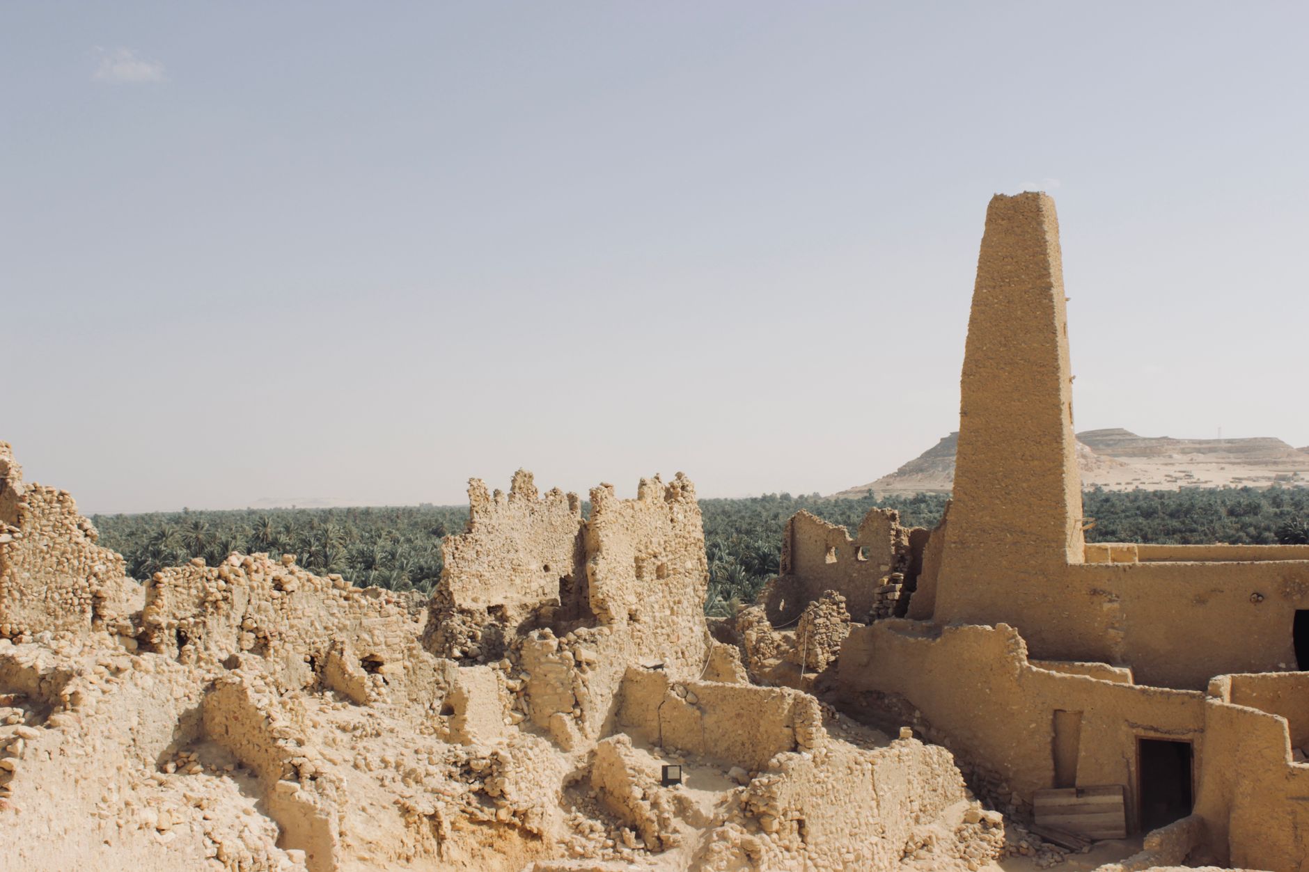 Explore the ancient ruins of an oracle temple amidst Egypt's arid landscape in Matrouh Governorate.