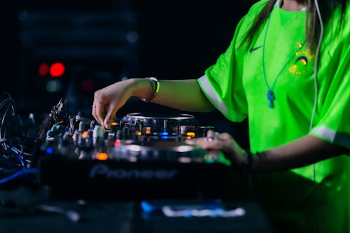 Close-up of a DJ Mixing Music on a DJ Controller