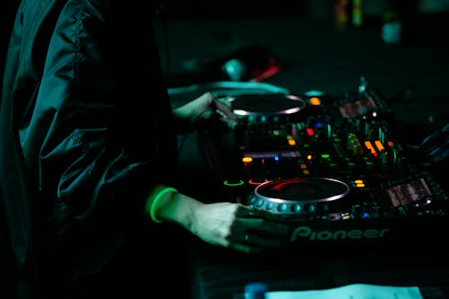 DJ with a Console in a Club 