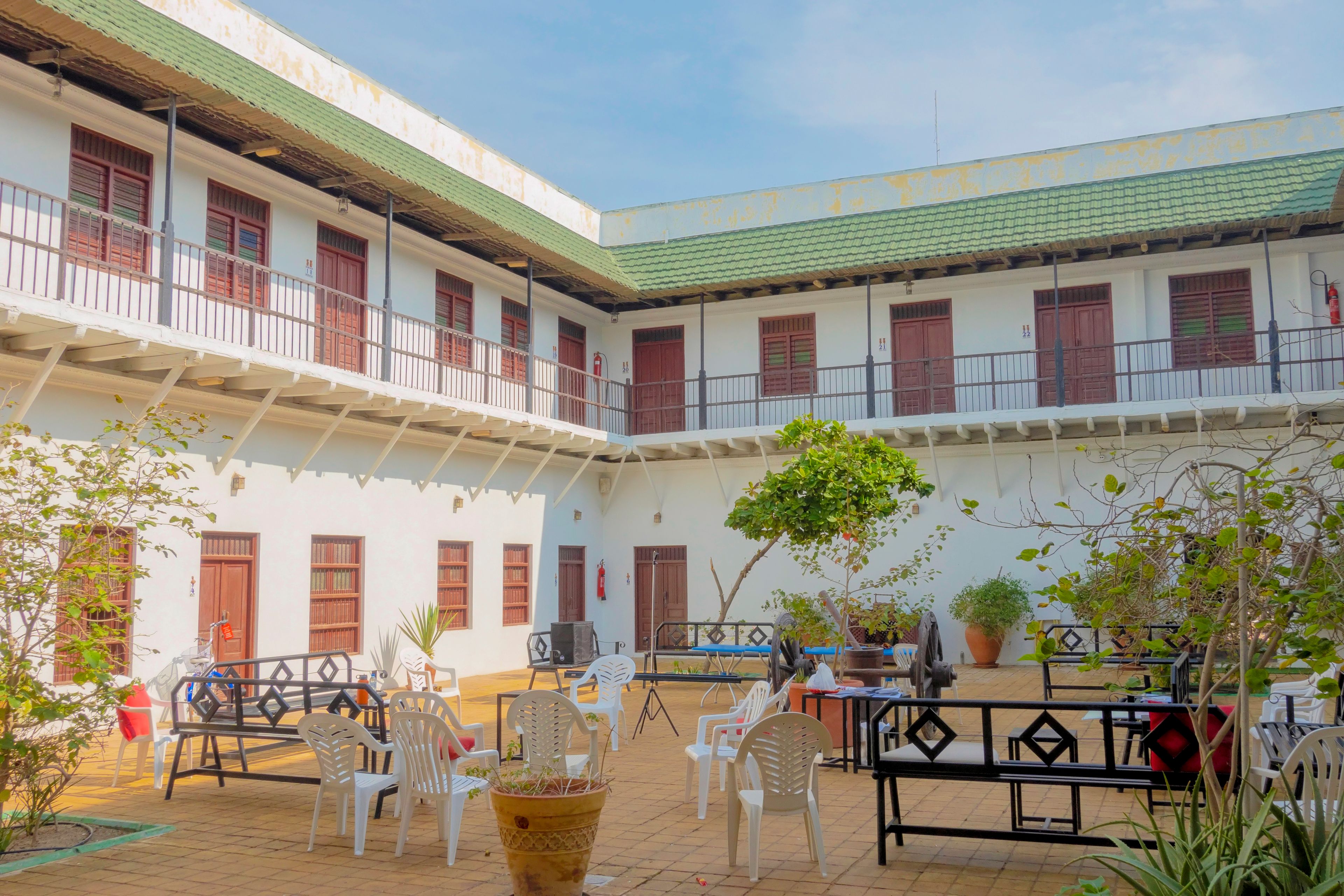 The courtyard seating among the plants