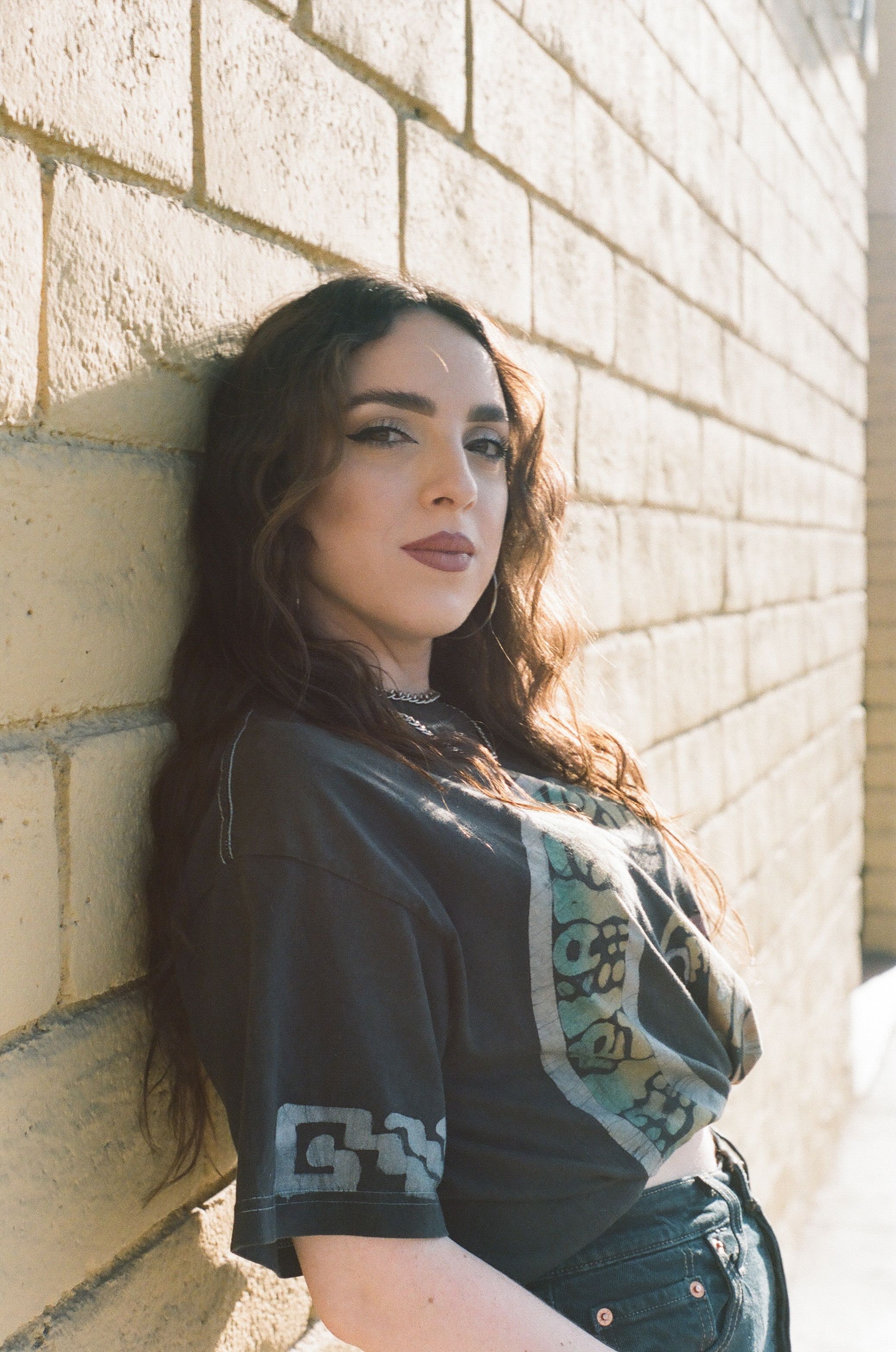 Portrait of Brunette Woman on a Street · Free Stock Photo