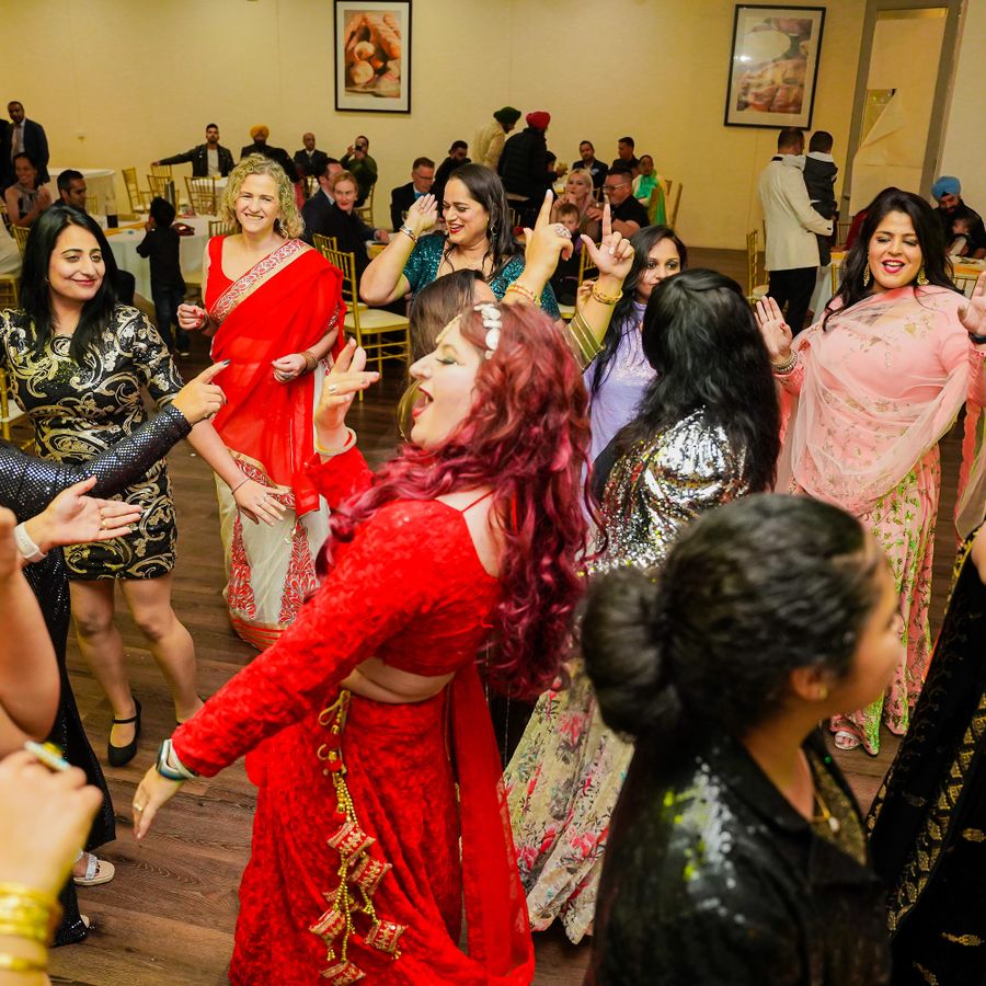 Indian families enjoying a festive gathering outdoors