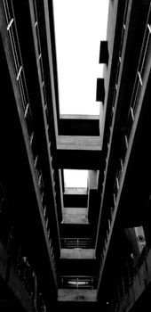 Monochrome view of urban building emphasizing modern architecture.
