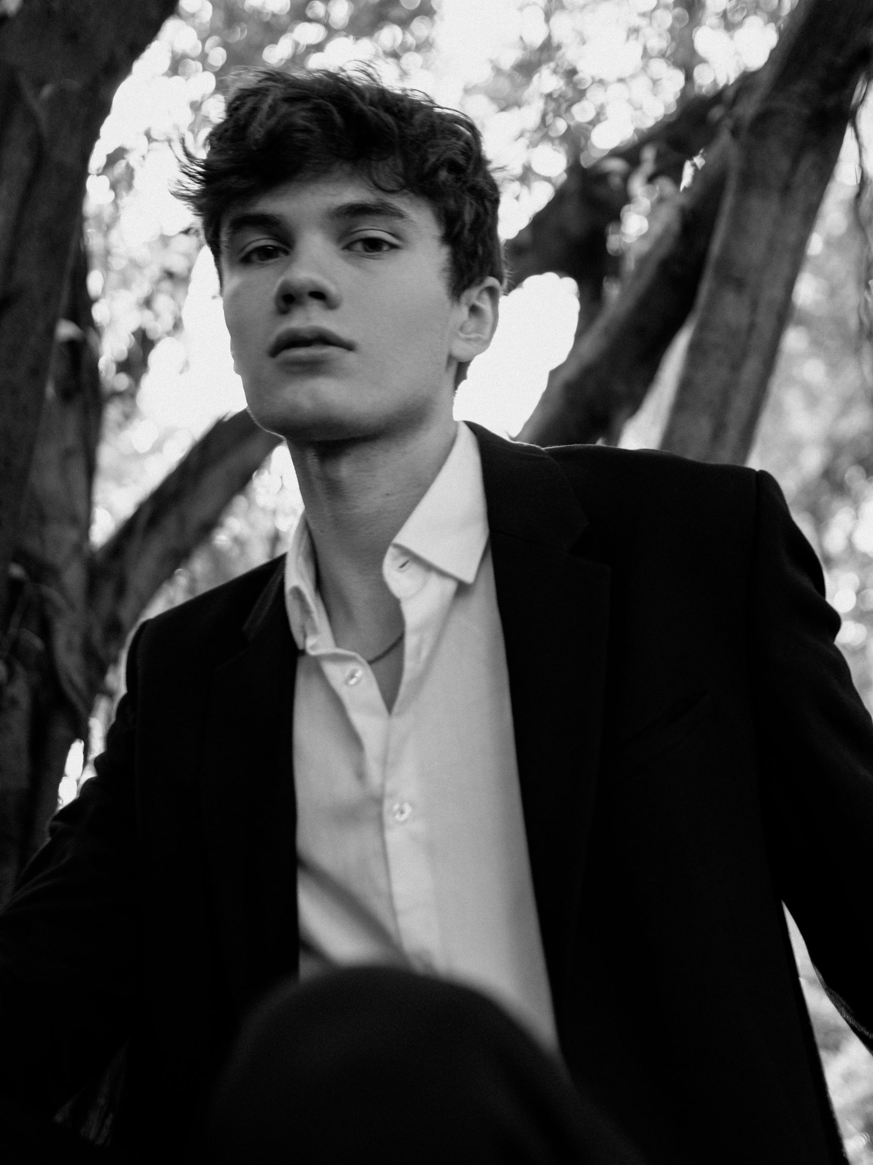 Man wearing relaxed refined menswear in a modern lifestyle setting